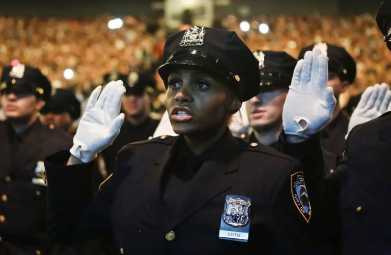 Police Woman taking oath - United Police Fund